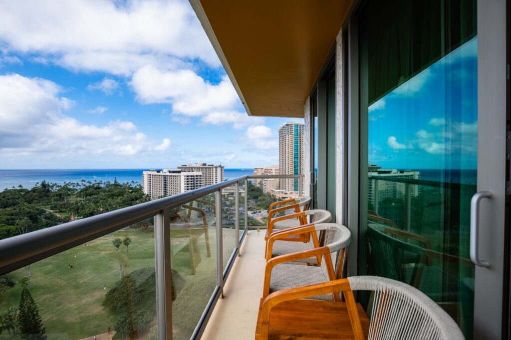 balcony view with ocean and golf course