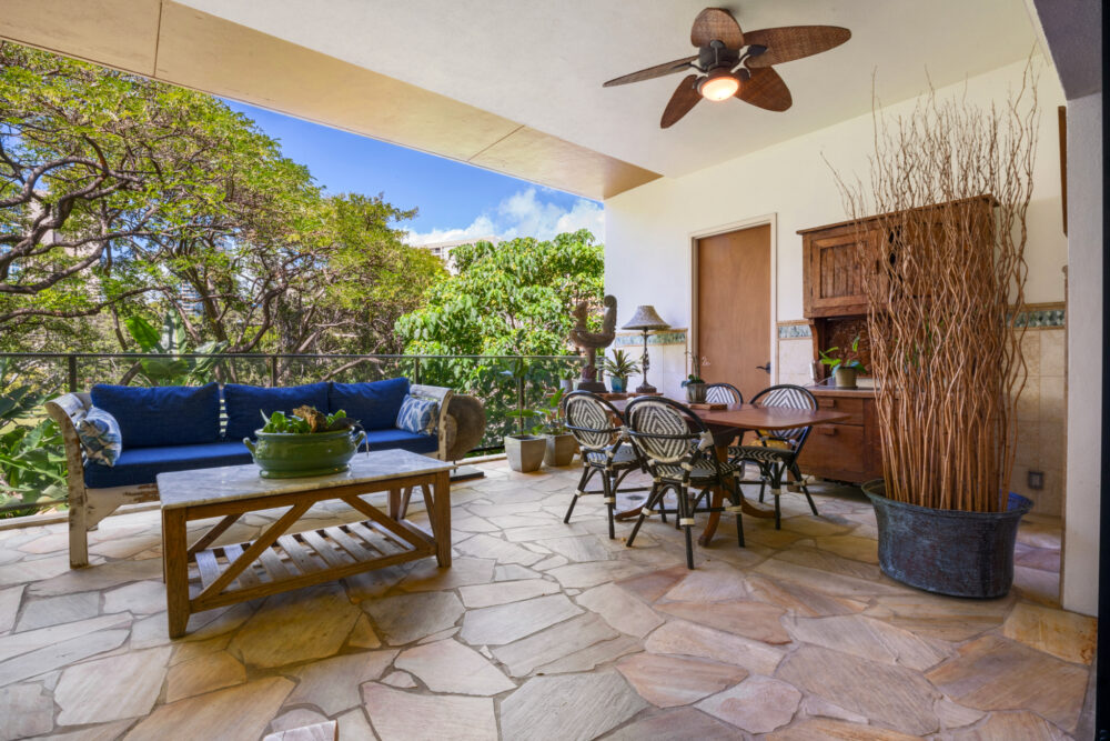 Two bedroom suite rental in Waikiki with fully equipped kitchen, modern décor, and spacious living area.